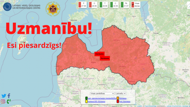 Ilustratīvs attēls, kurā redzama Latvijas karte, kas iekrāsota sarkanā krāsā, tādējādi brīdinot par ekstremālu karstumu. Klāt pievienots uzraksts - Uzmanību! Esi piesardzīgs!